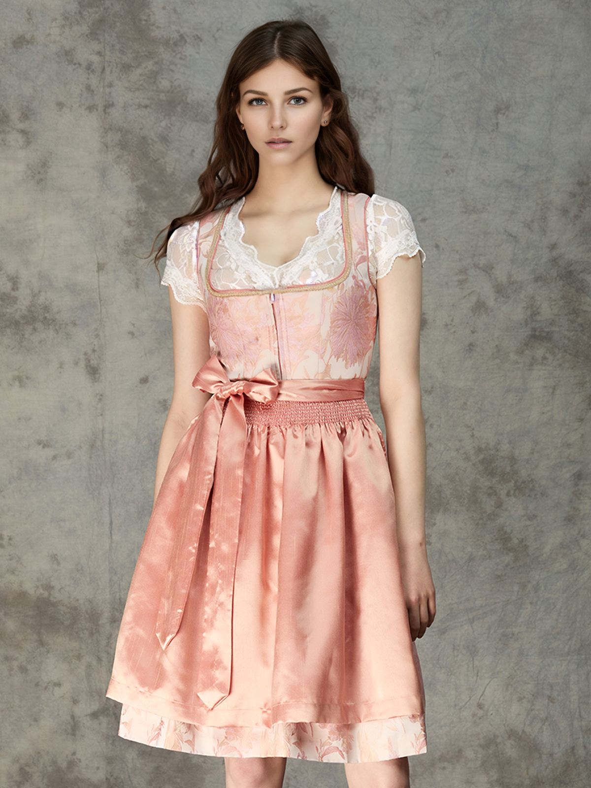 Ein dunkelblaues Dirndl mit rosa Schürze – ein harmonischer Kontrast